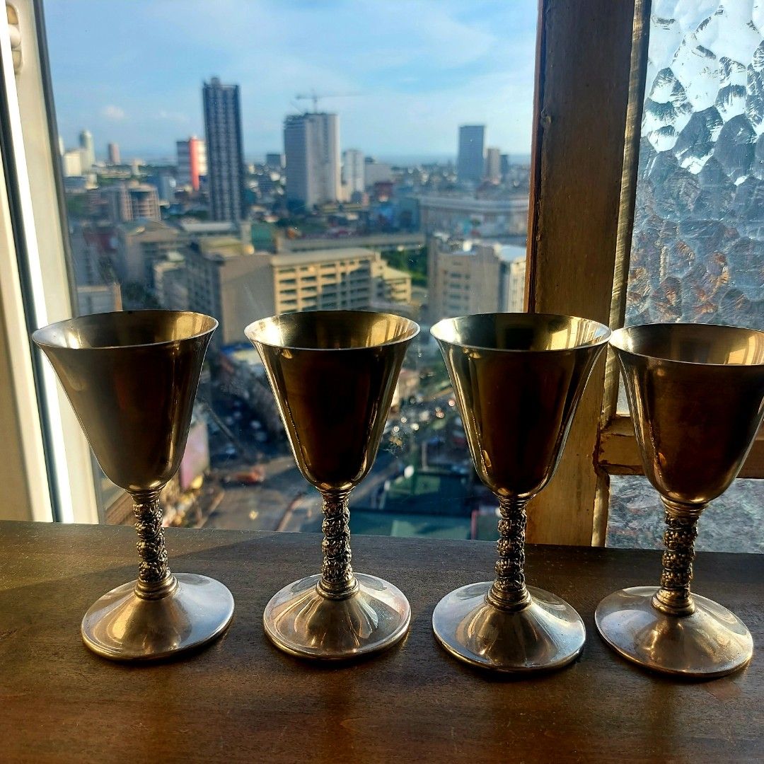 VINTAGE SILVER PLATED GOBLET (Category: Other Kitchenware & Tableware) located in Manila. Submitted by georgina123place (Listing ID 1370241195, Image 3). Description: a silver-plated wine goblet, likely a vintage piece from Valero, Spain, dating between 1900-1940. These goblets often feature a grapevine design on the stem and are about 4.5 inches tall. Key details: Material: Silver-plated. Origin: Made in Spain by Valero.Design: Grapevine design 
