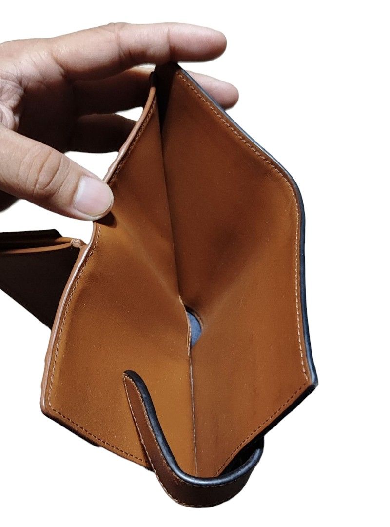 Celine Canvas Triomphe Small Strap Wallet (authentic💯) (Category: Luxury Bags & Wallets) located in Cebu City. Submitted by westleygics18 (Listing ID 1370329658, Image 3). Description: Celine Canvas Triomphe Small Strap Wallet (authentic)💯 Excellent Condition Very cute Wallet Actual Pictures Posted (minimal issue corner of wallet) Dm.