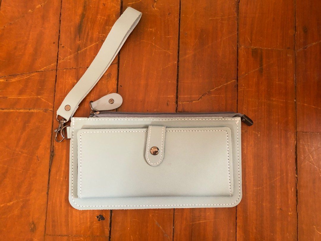Egg Light Blue Wallet Clutch Card Holder with Removable Strap (Category: Wallets & Card holders) located in Paranaque City. Submitted by minamigraine (Listing ID 1370282892, Image 1). Description: 4 x 8 in. good as new! .