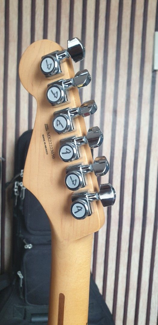 Fender player plus hss sunburts (Category: Musical Instruments) located in General Trias. Submitted by christianlaguerta (Listing ID 1370368399, Image 3). Description: new full set up with elexir 9.42 guage The Fender Player Plus Stratocaster HSS in a 3-tone sunburst finish is a solid-body electric guitar with an HSS pickup configuration (Humbucker-Single-Single). It features a gloss-finished alder body, a 25.5" scale length, and a 22-fret maple 