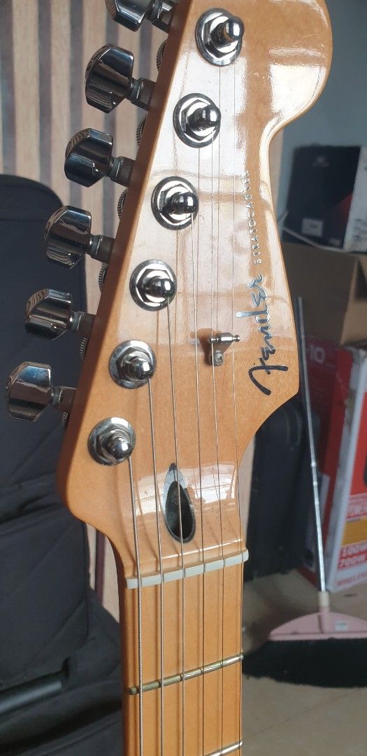 Fender player plus hss sunburts (Category: Musical Instruments) located in General Trias. Submitted by christianlaguerta (Listing ID 1370368399, Image 1). Description: new full set up with elexir 9.42 guage The Fender Player Plus Stratocaster HSS in a 3-tone sunburst finish is a solid-body electric guitar with an HSS pickup configuration (Humbucker-Single-Single). It features a gloss-finished alder body, a 25.5" scale length, and a 22-fret maple 