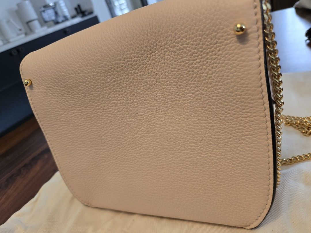 FLEURON SABLE (Category: Cross-body Bags) located in Singapore. Submitted by suluxury (Listing ID 1370396028, Image 5). Description: Fleuron is a mid range luxury bag from Paris, now a hit as a well made luxury brand. Bought the bag direct from their online website. Only used the bag twice as I have many bags. Condition is excellent. Price is non-nego to avoid hassling back and forth and this is the price comfortable for me. Link here for referen