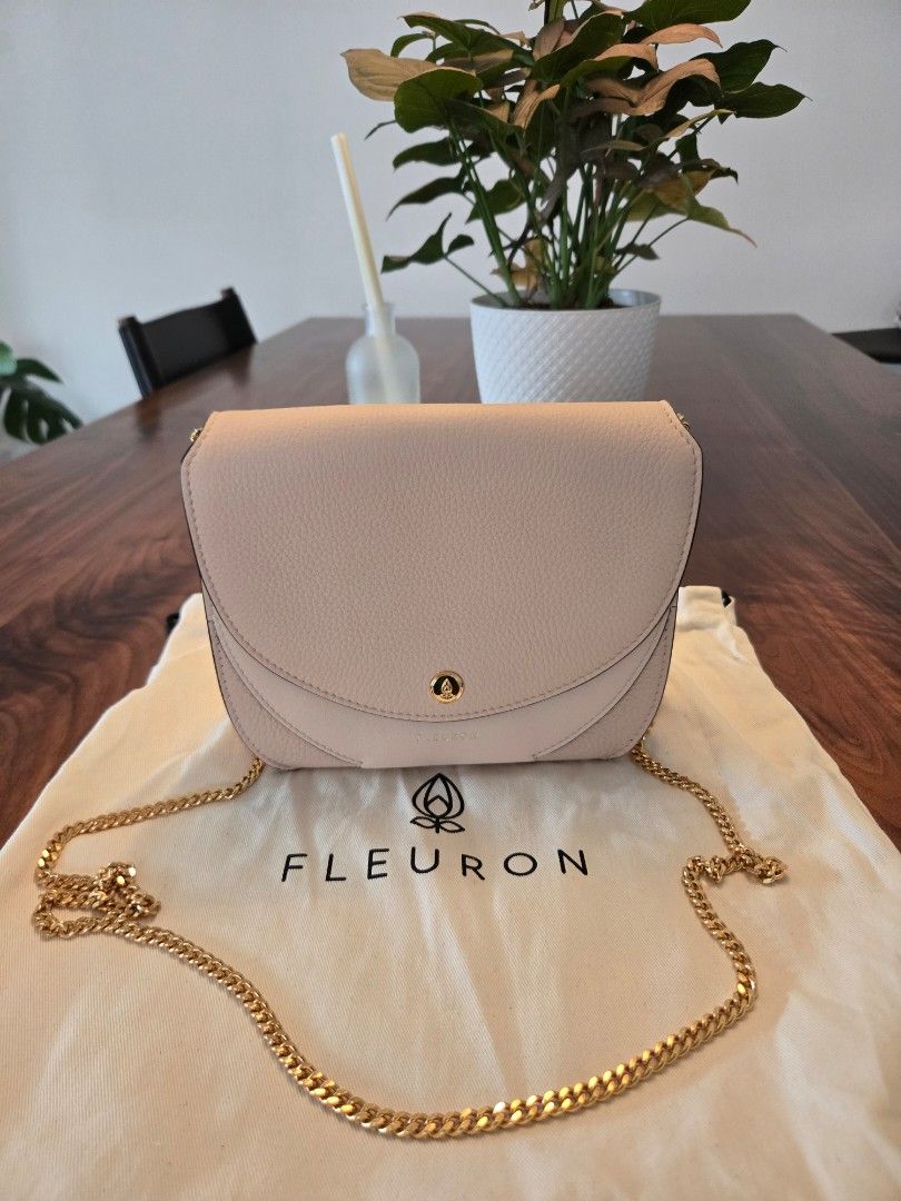 FLEURON SABLE (Category: Cross-body Bags) located in Singapore. Submitted by suluxury (Listing ID 1370396028, Image 2). Description: Fleuron is a mid range luxury bag from Paris, now a hit as a well made luxury brand. Bought the bag direct from their online website. Only used the bag twice as I have many bags. Condition is excellent. Price is non-nego to avoid hassling back and forth and this is the price comfortable for me. Link here for referen