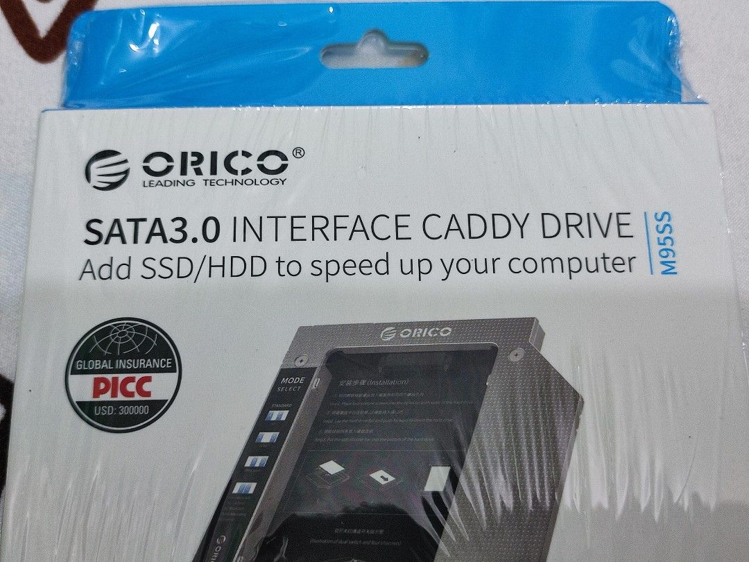 FS: Orico M95SS Laptop Hard Drive Caddy (Category: Laptops & Notebooks) located in Davao. Submitted by joieful_collectibles (Listing ID 1370301969, Image 3). Description: Orico M95SS SATA 3.0 Interface Caddy Drive is a laptop accessory designed to replace your laptop's optical drive (CD/DVD) with a 2.5-inch HDD or SSD, thereby expanding your storage capacity. ---------------- Product: ORICO M95SS Interface: SATA revision 3.0 optical drive interfa