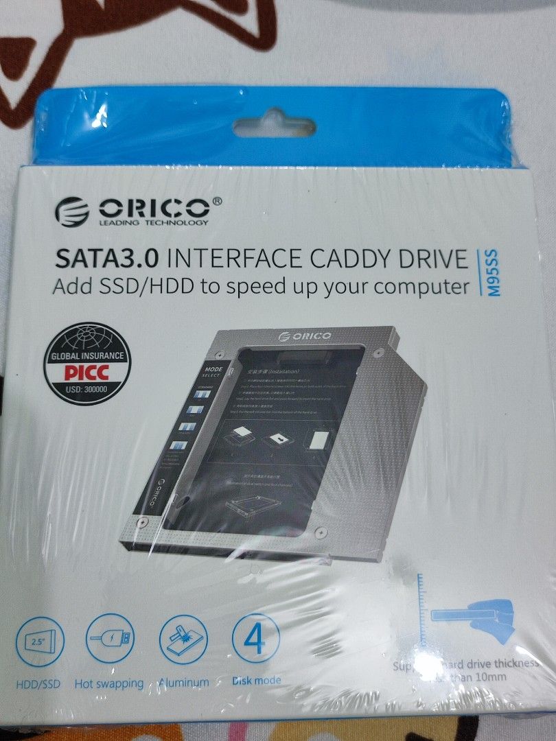 FS: Orico M95SS Laptop Hard Drive Caddy (Category: Laptops & Notebooks) located in Davao. Submitted by joieful_collectibles (Listing ID 1370301969, Image 1). Description: Orico M95SS SATA 3.0 Interface Caddy Drive is a laptop accessory designed to replace your laptop's optical drive (CD/DVD) with a 2.5-inch HDD or SSD, thereby expanding your storage capacity. ---------------- Product: ORICO M95SS Interface: SATA revision 3.0 optical drive interfa