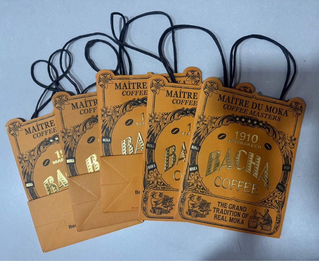 Bacha Coffee paper bag (Category: Tote Bags) located in Manila. Submitted by chinchinshaven (Listing ID 1250015867, Image 1). Description: 5 pcs available (1 sold) Dimension: Width 19.25cm Height 24cm Depth 10cm.