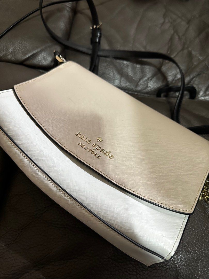 Kate Spade Carson Convertible Crossbody bag (Category: Luxury Bags & Wallets) located in Quezon City. Submitted by camille96 (Listing ID 1370268572, Image 2). Description: It's made of saffiano leather. It can be used as a sling bag, clutch, shoulder bag or crossbody bag. It has a magnetic snap flap closure and an exterior slip pocket. The interior has two-way spade jacquard lining with one slip pocket. Approximate dimensions: 6.87"h x 9.12"w x 2