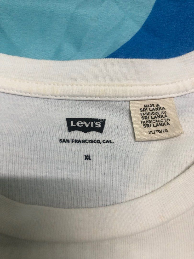 LEVIS (Category: Tshirts & Polo Shirts) located in Jasin. Submitted by addyzaidy (Listing ID 1370264121, Image 3). Description: Levis’s shirt utk dijual. Condition tip top. Agak kuning pasal pakai cuma 2-3 kali. Saiz boleh refer gambar. Made in Sri Lanka. RM49 ppd.