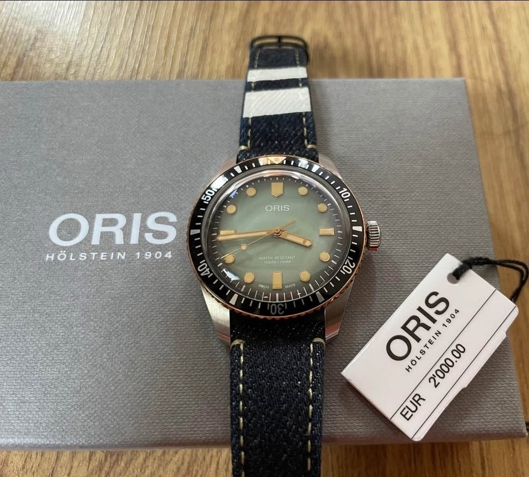 ORIS X MOMOTARO DIVER SIXTY-FIVE (Category: Luxury Watches) located in Taguig. Submitted by masterbert (Listing ID 1370286115, Image 3). Description: RARE/SLIGHTLY USED CONDITION for sale/trade Technical Details Reference Number 01 733 7707 4337-Set Case Multi-piece stainless steel/bronze case, minutes scale top ring. Sapphire, domed on both sides, anti-reflective coating inside. Stainless steel, special engravings, screwed. 40.00 mm Size 10 bar 
