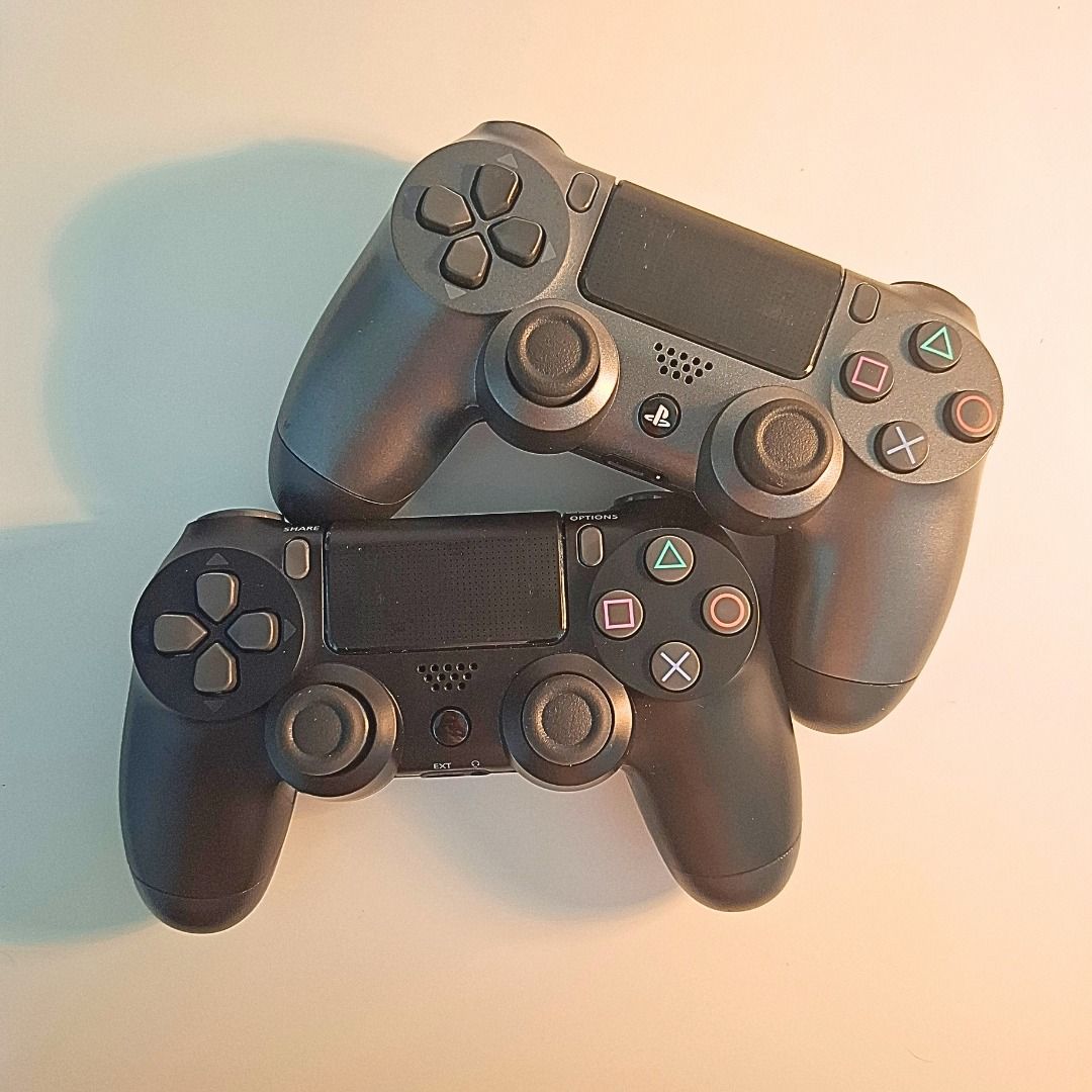 PS4 Bundle – 2 Controllers + 2 Games + Charging Stand – RM800 