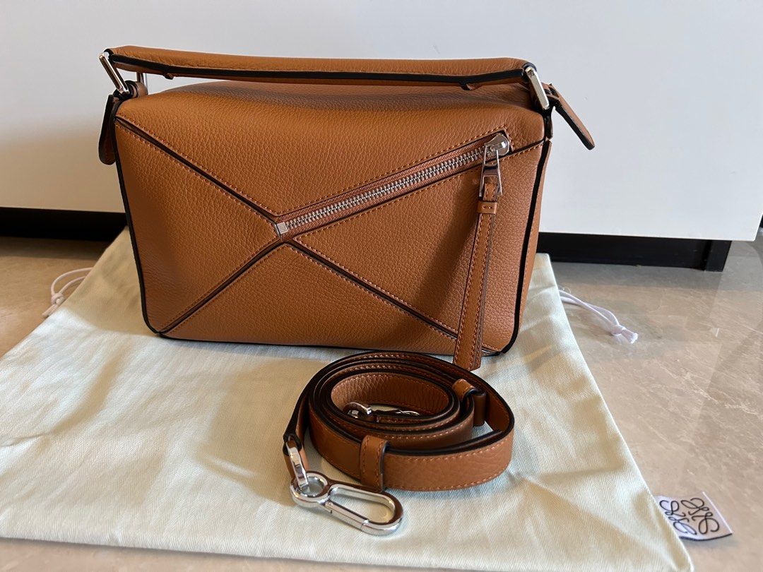 Puzzle Loewe Small Tan (Category: Bags & Wallets) located in Singapore. Submitted by blimey.b (Listing ID 1367573705, Image 2). Description: Included - dust bag, certificate of authenticity (w/ a small fee).