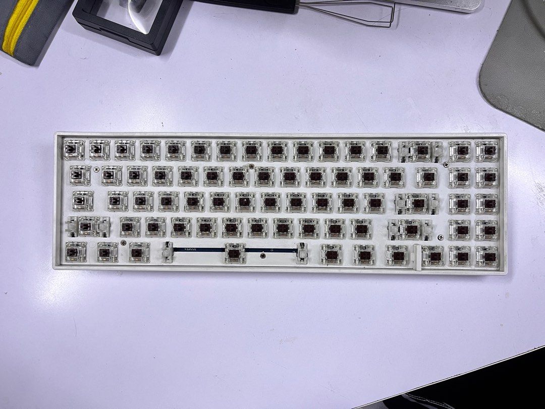 RK71 Keyboard (Category: Computer Keyboard) located in Quezon City. Submitted by msamval (Listing ID 1370353509, Image 2). Description: RK71 Keyboard - not hotswappable - brown switches - used only for school - complete with manual & box inclusions - type c, magnetic stand & keycap puller Flaw: missing rubber sole (check pic) Rfs: upgraded.