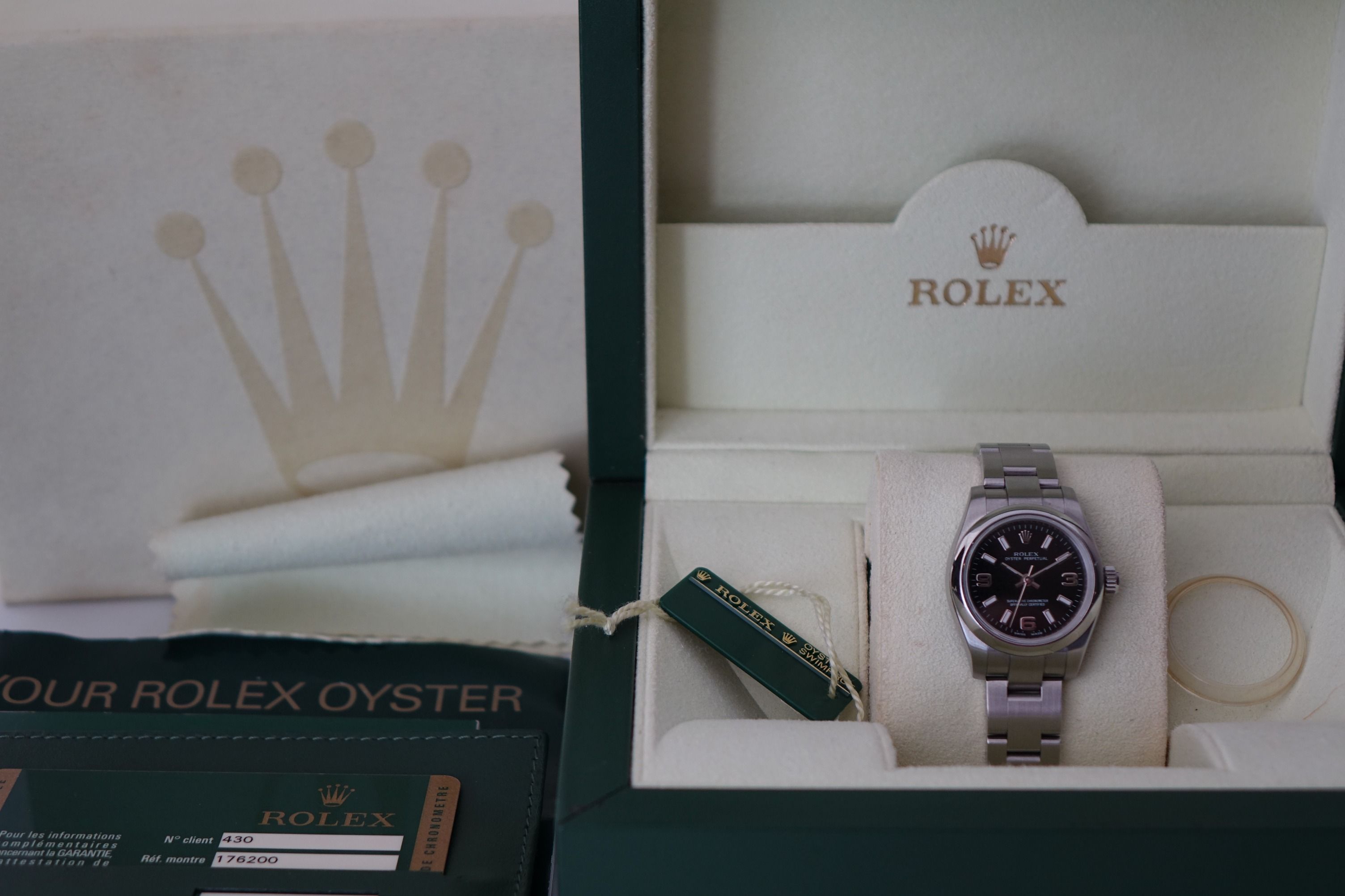 Rolex OP 176200 black 369 full set (Category: Watches) located in Singapore. Submitted by wristime (Listing ID 1370351533, Image 3). Description: Join our tele channel for the latest updates and exclusive deals! t.me/wristime Rolex Oyster Perpetual 176200 with the rare and sought-after black 3-6-9 dial. This elegant 26mm stainless steel watch features luminous Arabic numerals at 3, 6, and 9 o’clock, a smooth bezel, and a classic Oyster bracelet. 