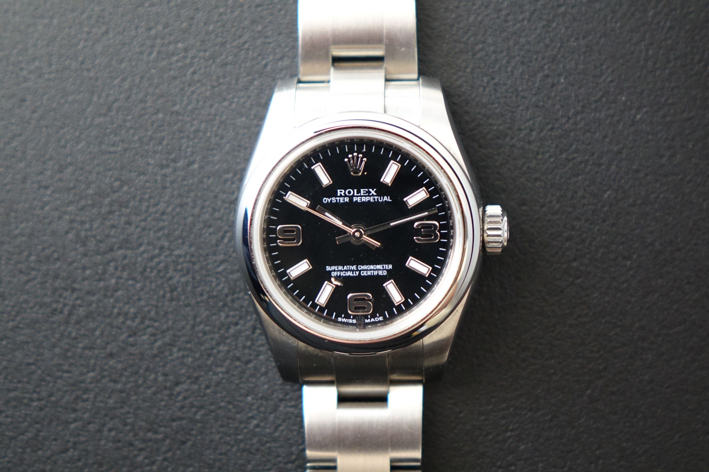Rolex OP 176200 black 369 full set (Category: Watches) located in Singapore. Submitted by wristime (Listing ID 1370351533, Image 1). Description: Join our tele channel for the latest updates and exclusive deals! t.me/wristime Rolex Oyster Perpetual 176200 with the rare and sought-after black 3-6-9 dial. This elegant 26mm stainless steel watch features luminous Arabic numerals at 3, 6, and 9 o’clock, a smooth bezel, and a classic Oyster bracelet. 