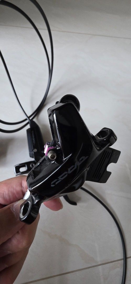 Sram Code Stealth Silver (Category: Parts & Accessories) located in Singapore. Submitted by sohnice2001 (Listing ID 1370344473, Image 4). Description: As above. New brake pads installed. Our legendary, full-powered brake now features a new technology to improve your cockpit aesthetic: Stealth. The all-new lever body design brings the hose closer to the bar, allowing for a sleeker, more modern ride. The proven internals remain the same, with Swing