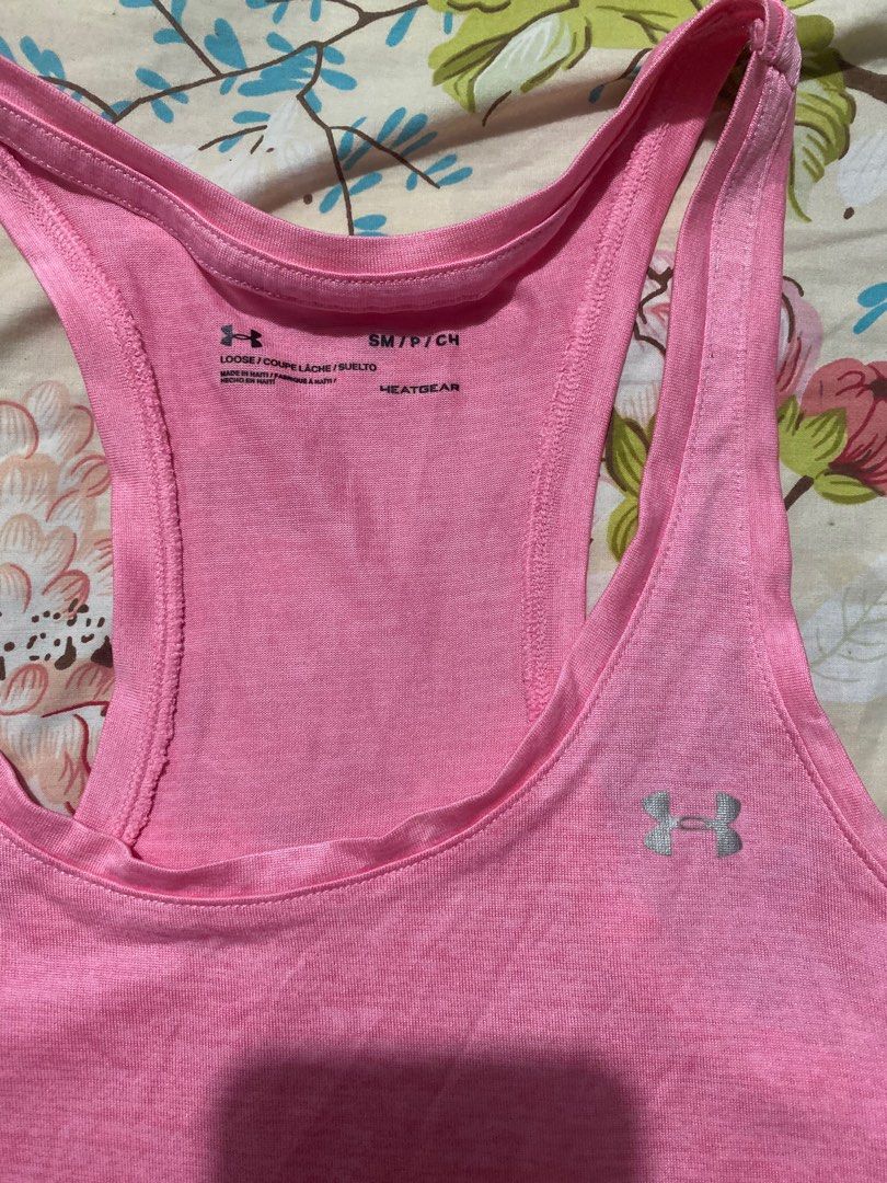 Under Armour sleeveless dri fit top (Category: Activewear) located in Cauayan City . Submitted by mtan15 (Listing ID 1370395837, Image 2). Description: Authentic Under Armour sleeveless dri fit top, size small in very good condition. Nice color.