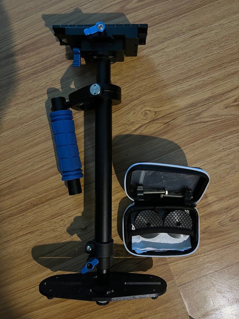 Video stabilizer steady cam gimbal (Category: Camera Bags & Carriers) located in Pasig City. Submitted by wilsonwill38327 (Listing ID 1370305366, Image 1). Description: Good cond for manual video stabilization fits mirrorless and dslr with medium size lens Pick up with your fav rider.