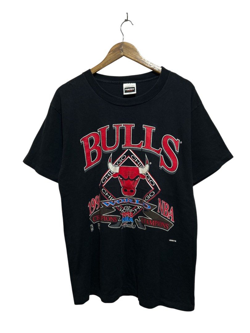 Vintage Chicago Bulls (Category: Tshirts & Polo Shirts ) located in Angeles City. Submitted by outboxph (Listing ID 1370361000, Image 3). Description: Vintage Chicago Bulls Tee by Tultex Single Stitch Hem, Sleeves, and Neckline Size: Large on tag Dimensions: 29Lx20.5W Condition: 8/10 hairline paintcracks .