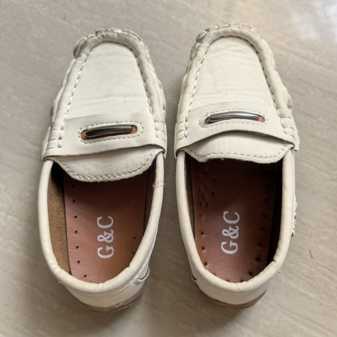 White Loafers for kids size 26 (Category: Babies & Kids Fashion) located in Cavite. Submitted by mdsmak (Listing ID 1370275542, Image 1). Description: Used once (for wedding) Color beige Size 26 (2-3 years old) No issues, just needs cleaning.