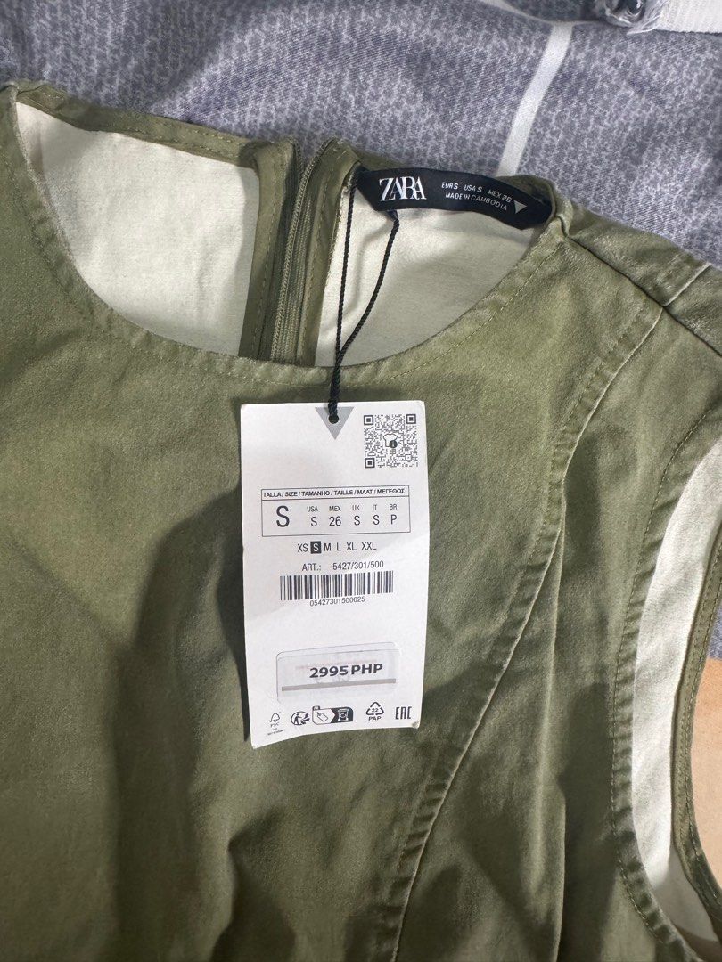 Zara Army Green Dress (Category: Dresses) located in Pasig City. Submitted by bnc511 (Listing ID 1370336705, Image 3). Description: Never worn! Completely brand new. SRP was 2995. Straps can be cut off! Rfs: Decluttering.