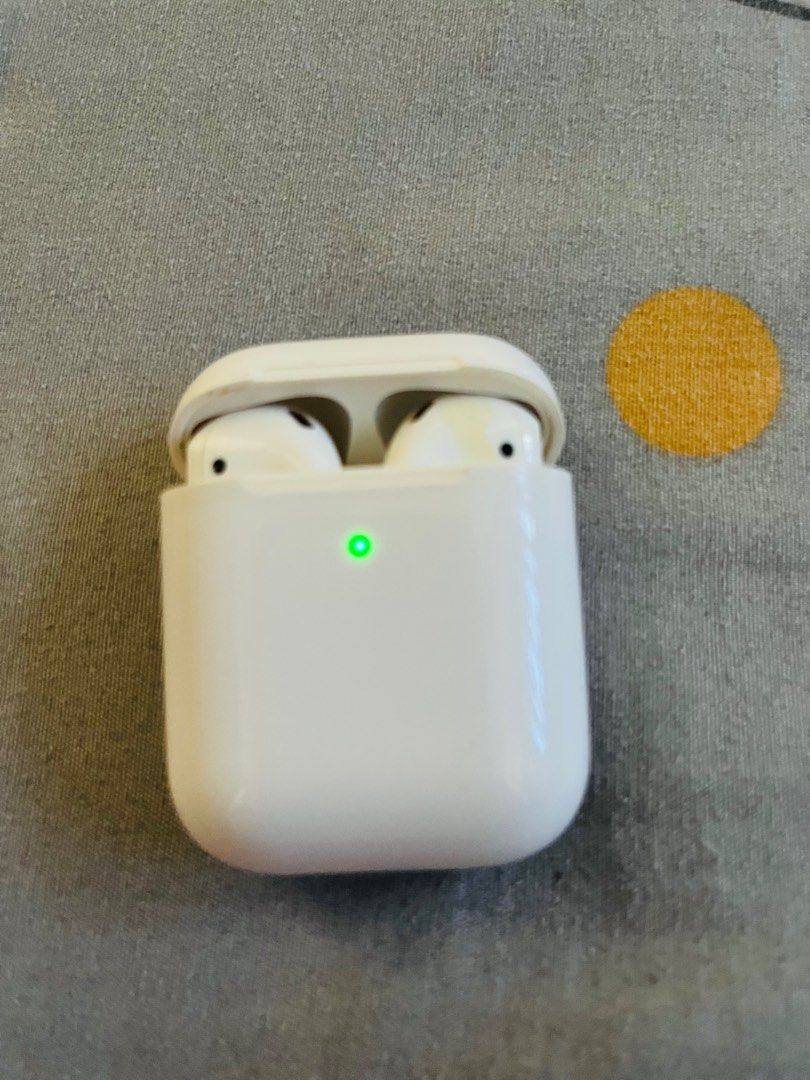 Airpods Apple Original (Category: Earphones) located in Cavite. Submitted by cheleshops (Listing ID 1370461465, Image 3). Description: For Sale!!! Need for Requirements Airpods Apple Original 💯 2nd Generation Good Condition W/Case&Charger Slightly Used Dasma Meet Up.