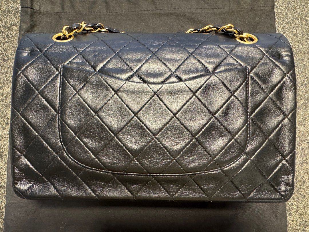 Chanel vintage classic double flap (Category: Bags & Wallets) located in Singapore. Submitted by neeneeneey (Listing ID 1370496187, Image 3). Description: 100% authentic if not I will fully refund you Comes with sticker, booklets and authentication card Bag went for bag spa for a color changed to black color (cost sgd $1200) No fussy buyer please .