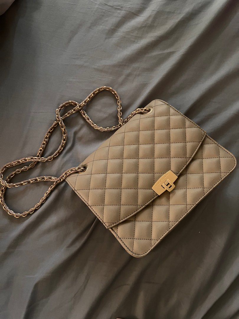 Charles and Keith Bag (Category: Shoulder Bags) located in Pasig City. Submitted by declutterwks (Listing ID 1370484094, Image 1). Description: Used twice only. Super ganda nito in actual! .