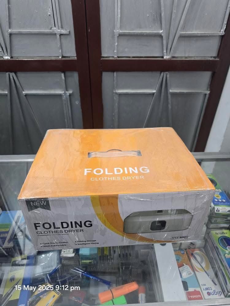 Folding Clothes Dryer (Category: Cleaning Tools & Supplies) located in Santa Rosa. Submitted by dlsud0708 (Listing ID 1370504691, Image 2). Description: Folding Clothes Dryer (Model HYJ-8006) Key Features include: - Quick drying of clothes. - Foldable design for easy storage. - Small and portable for convenience. - Intelligent timing function. - Utilizes UV + PTC drying technology for efficient and fast drying. - Suitable for both household and t