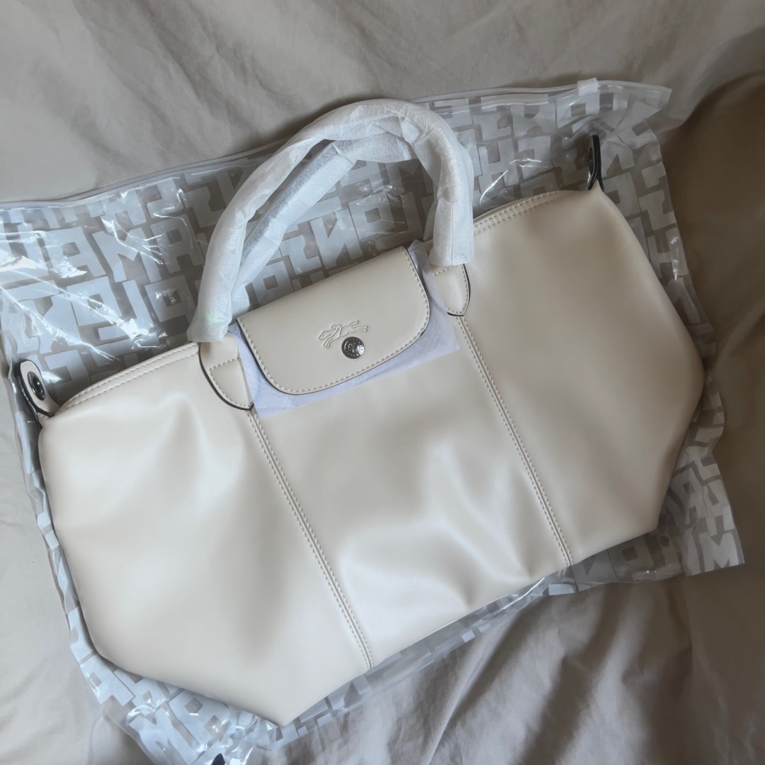 Longchamp Le Pliage Cuir Sand L, Luxury, Bags & Wallets on Carousell