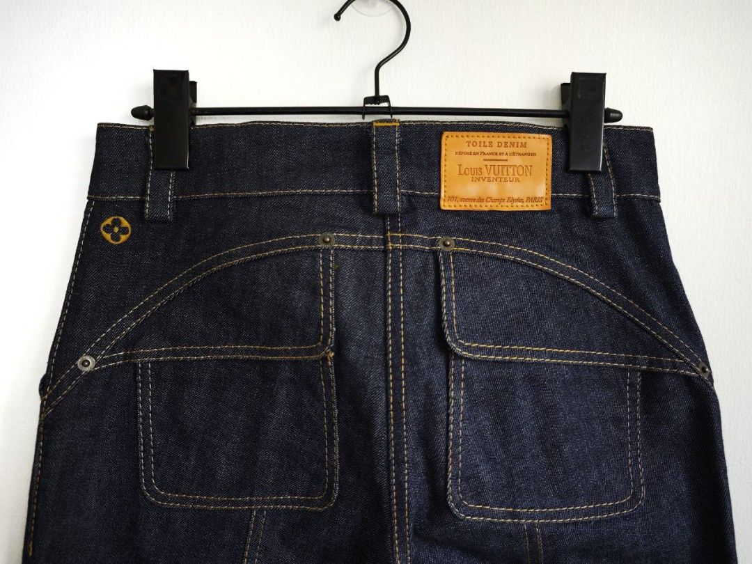 Louis Vuitton Cotton Denim Capri Pants (Category: Luxury Apparel) located in Cavite. Submitted by _collectorschoice_ (Listing ID 1370596287, Image 2). Description: ° Dark blue color with yellow stitching, monogram flower embroidery on the side ° This stylish piece from Louis Vuitton is ideal for casual days ° Made from 100% cotton ° They are styled with contrast stitching ° Button closure and are designed to offer a good fit ° Pair with simple te