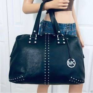 Michael Kors Large Duffle Weekender Travelling Bag (Category: Luxury Bags & Wallets) located in Manila. Submitted by shopaholic_gurl (Listing ID 1370509157, Image 3). Description: Excellent condition Black mk leather Studded travelling bag Big enough to carry a week’s essential.