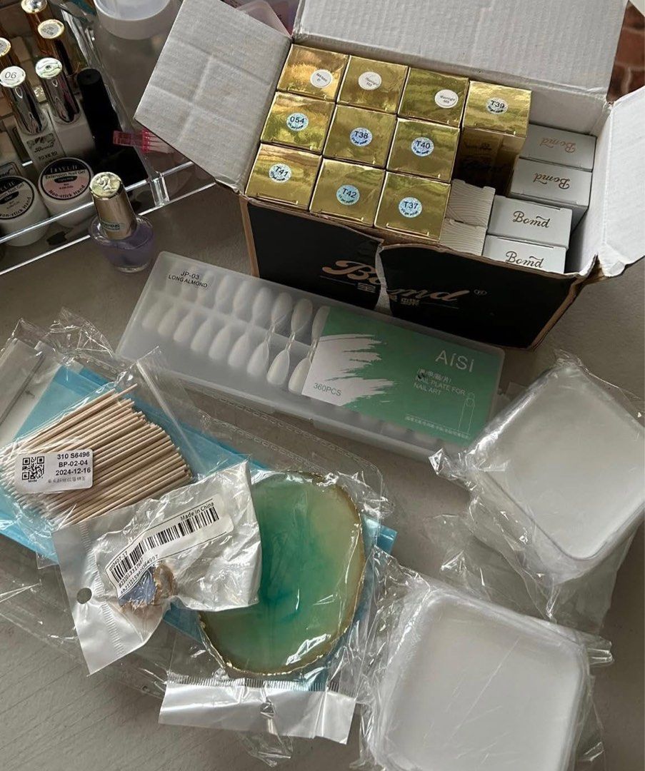 Nail Business Starter Pack (Category: Hands & Nails) located in General Trias. Submitted by LaurElizBoutique (Listing ID 1370469395, Image 2). Description: Nail Drill Dust Collector Lamp, UV Flash (2 styles) 2 chrome powders 2 brushes Nail clipper 2 Types of Nail Tips Acrylic Storage Nail Art tools Alcohol Pads Sterilizer Pouch Press-On nails storage Rhinestone Glue Gel Polishes NEGOTIABLE FOR SURE BUYER!.