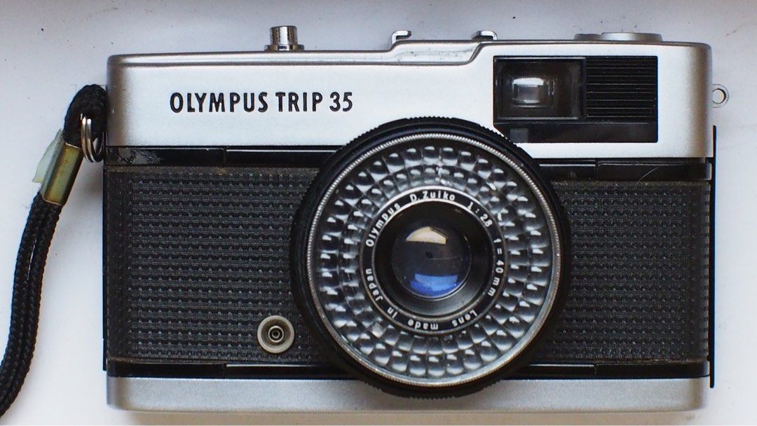 Olympus trip 35 film camera (Category: Cameras) located in Las Pinas. Submitted by film101 (Listing ID 1370549795, Image 1). Description: Olympus trip 35 film camera Working meter Working shutter All aperture working good Optics with tiny dust With straps Infinity glass very good Ready to use.