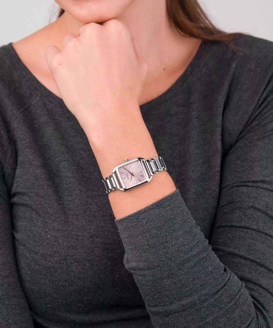 Seiko SWR077P1 Essentials Mauve Pink Grid Pattern Dial Analog Stainless Steel Ladies Dress Watch SWR077 (Category: Women's Watches) located in Singapore. Submitted by kbvkbv (Listing ID 1370595972, Image 3). Description: Watch Information Movement Type : Quartz Precision : ±15 seconds per month Case Size Thickness:6.4mm Diameter:26.0mm Lug-to-lug:34.8mm Crystal : Hardlex Clasp : Three-fold clasp with push button release Distance between lugs : 15