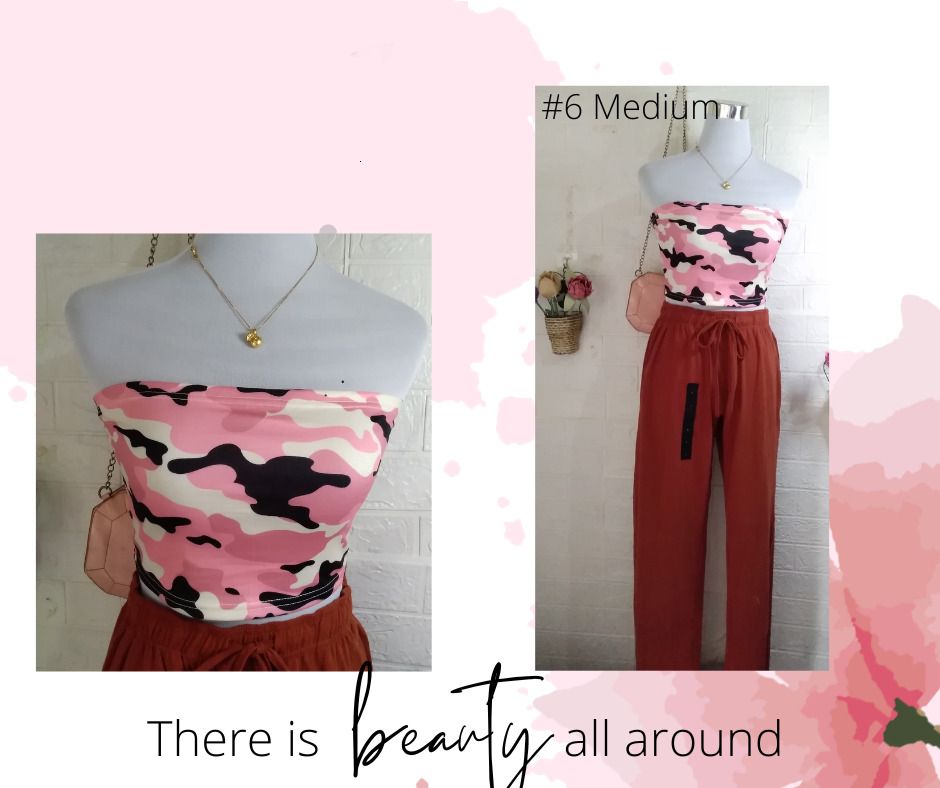 Shein sey tube top (Category: Sleeveless) located in Quezon City. Submitted by stylishchic08 (Listing ID 1370465805, Image 3). Description: Shein Tube top Brand new 65 per piece Size White with heart pattern- Large white black print Small PINK Camo medium Mannequin vital 34-36 bust line waist 27 inches.