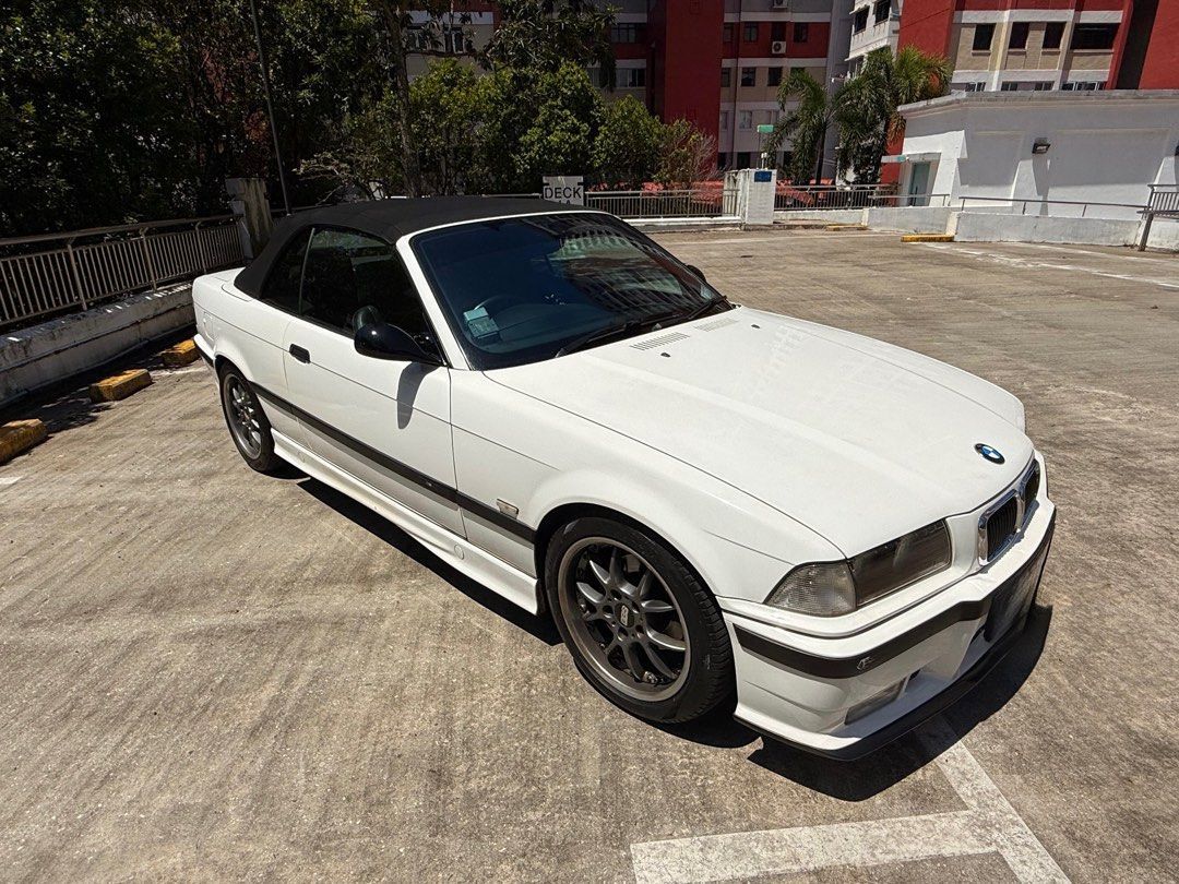 BMW 3 Series Cabriolet 318IA Classic E36 Auto (Category: Used Cars) located in Singapore. Submitted by ezstation (Listing ID 1370681802, Image 2). Description: **🏁 1997 BMW 318IA– Classic E36 CABRIO – Well-Maintained – Great Condition!** ### **🔧 Specifications:** - **Model:** 1997 BMW 318IA (E36) - **Body Style:** 2-door Cabrio - **Engine:** 1.8L - **Transmission:**Automatic - **Mileage:**170,000 - **Color:**White [Interior Color – Black Leathe