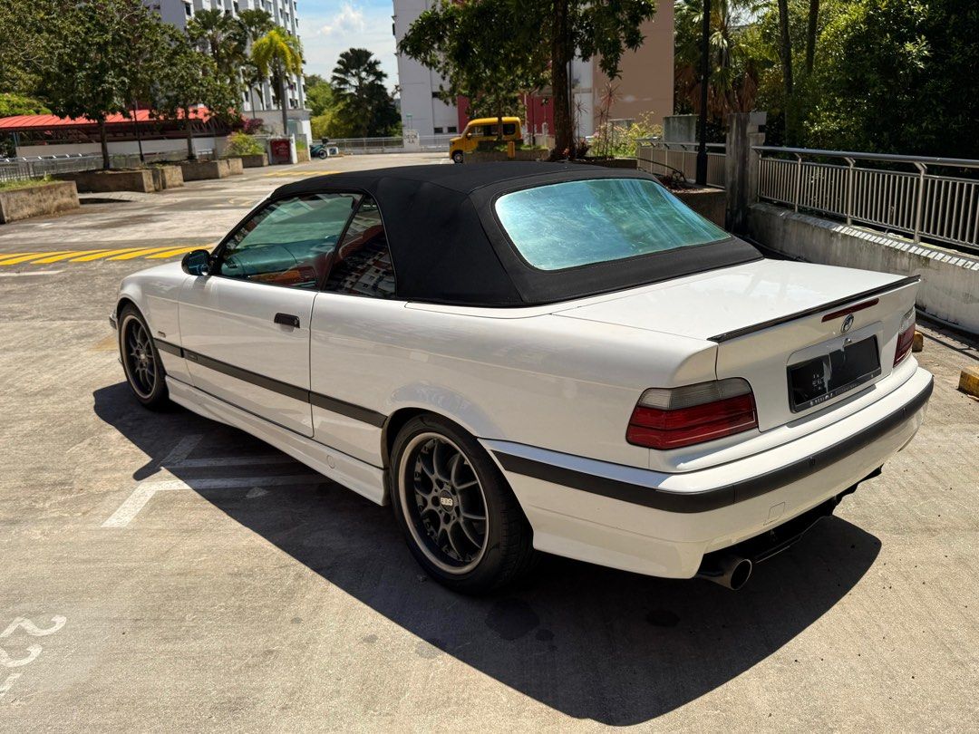 BMW 3 Series Cabriolet 318IA Classic E36 Auto (Category: Used Cars) located in Singapore. Submitted by ezstation (Listing ID 1370681802, Image 3). Description: **🏁 1997 BMW 318IA– Classic E36 CABRIO – Well-Maintained – Great Condition!** ### **🔧 Specifications:** - **Model:** 1997 BMW 318IA (E36) - **Body Style:** 2-door Cabrio - **Engine:** 1.8L - **Transmission:**Automatic - **Mileage:**170,000 - **Color:**White [Interior Color – Black Leathe