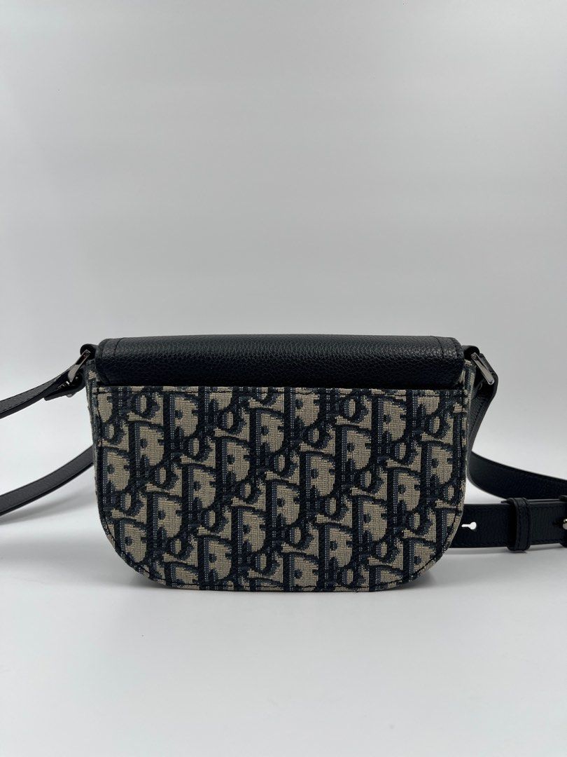 Dior Oblique Saddle Messenger Bag Small (Category: Luxury Bags & Wallets) located in Manila. Submitted by patrickmaningas (Listing ID 1370744908, Image 3). Description: Comes with Dustbag and Care cards Guaranteed Authentic, Open for Meetup :).