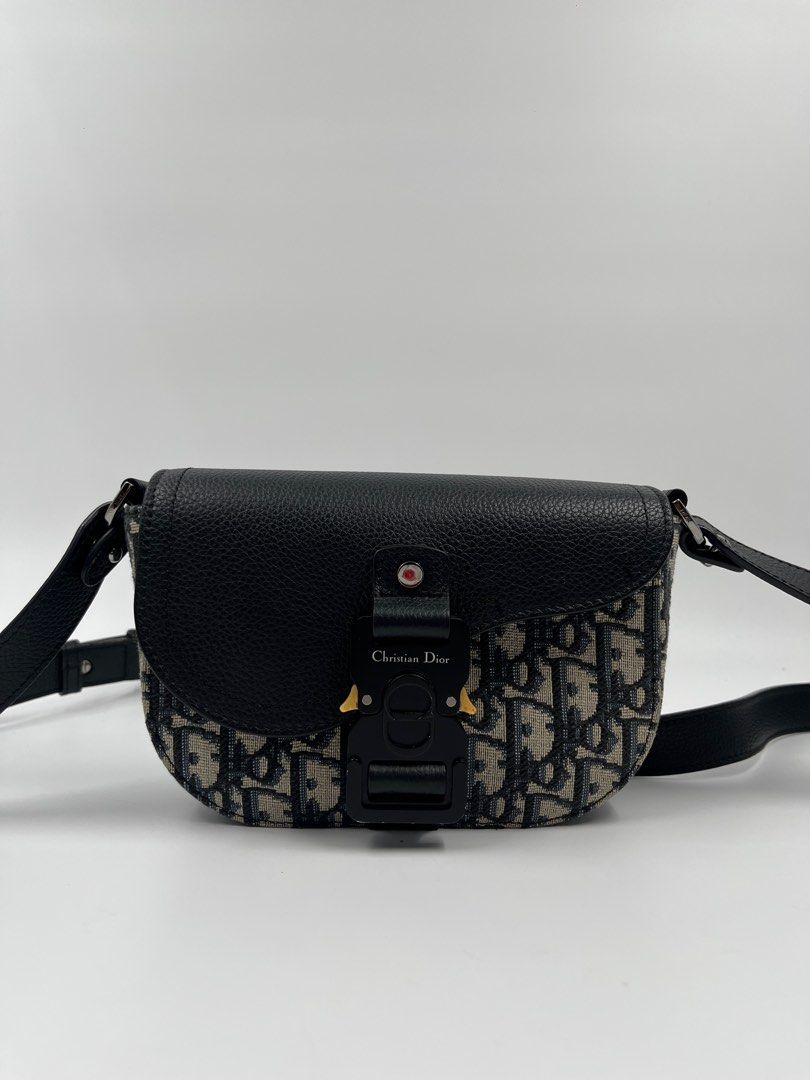 Dior Oblique Saddle Messenger Bag Small (Category: Luxury Bags & Wallets) located in Manila. Submitted by patrickmaningas (Listing ID 1370744908, Image 2). Description: Comes with Dustbag and Care cards Guaranteed Authentic, Open for Meetup :).