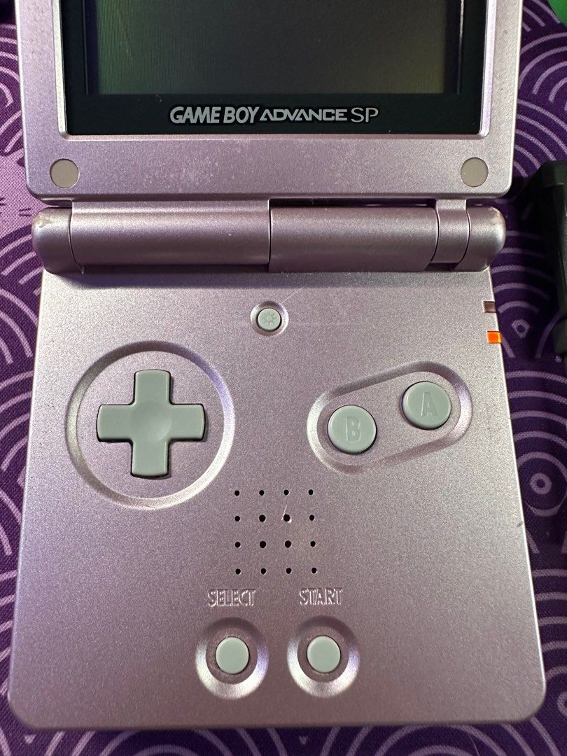 Gameboy Advance SP AGS-001 Pearl Pink Bundle (Category: Nintendo) located in Paranaque City. Submitted by kamiruizu.clutter (Listing ID 1370670611, Image 3). Description: GAMEBOY ADVANCE SP AGS-001 PEARL PINK 4000php inclusions: -GB SP AGS-001 unit (non-ips, front lit screen) (Condition: Visible signs of usage, scratches and dust beneath screen. Overall working and charging. Volume is decent. Screen light is working. Buttons clicky and responsive