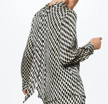 MANGO BOW checked shirt (Category: Blouses) located in Makati City. Submitted by worn2work_treasures (Listing ID 1370790061, Image 3). Description: This shirt can be worn in two ways—you can wear the back side with the bow as the front, and vice versa. Honestly, no one even noticed when I wore it that way, since the prints, including the bow design, made it look perfectly intentional..