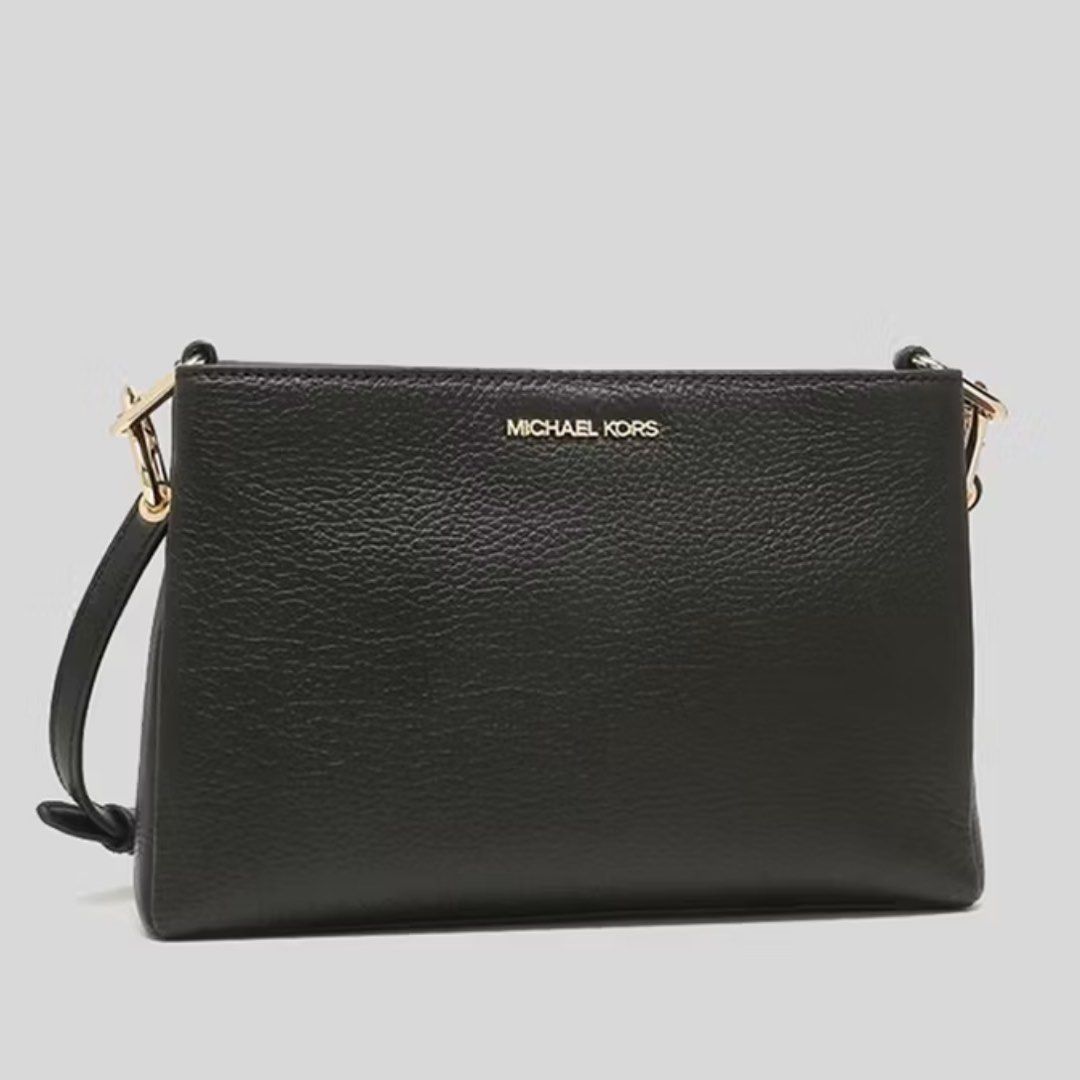 Michael Kors Trisha Medium Pebbled Leather Crossbody Bag (Category: Bags & Wallets) located in Singapore. Submitted by cindy76 (Listing ID 1370620668, Image 2). Description: Brand new with tag Collect from 733681 Low ballers will be ignored.