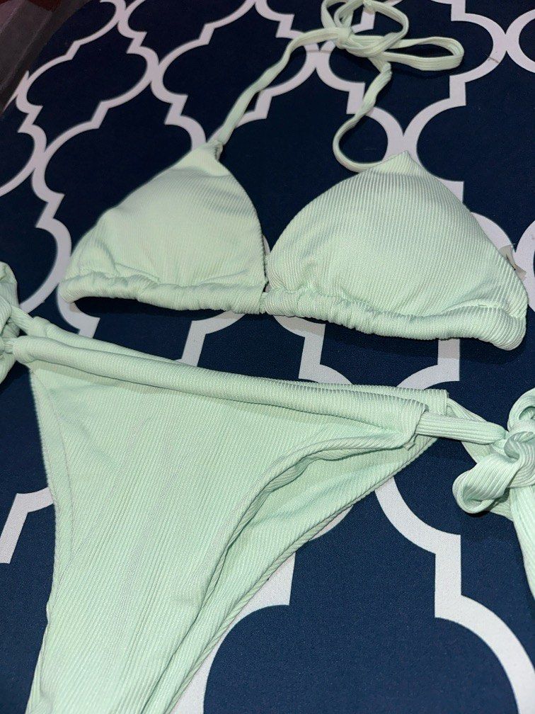Shein Mint Green Self Tie Bikini Set Ribbed Fabric (Category: Bikinis & Swimsuits) located in Manila. Submitted by sharmscarousel (Listing ID 1370621693, Image 2). Description: Brand new Shein bikini Comes in original Shein pouch RFS: decluttering! Never used, doesn’t fit me Can be bundled with other bikinis posted in my listings.