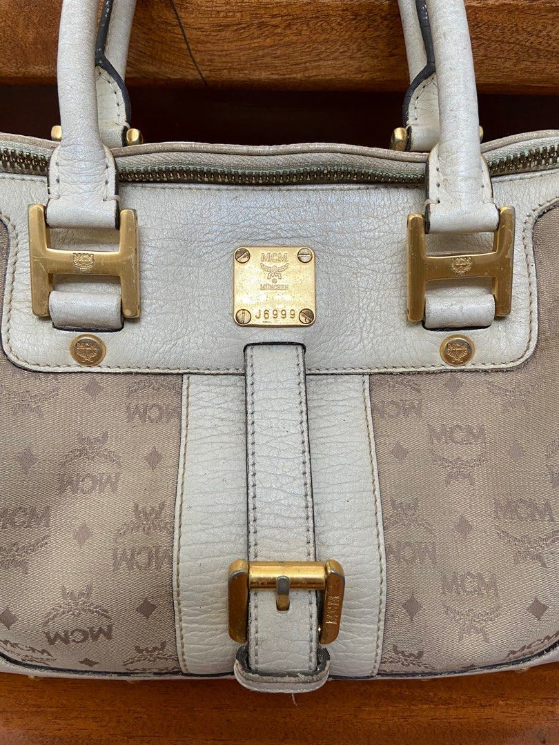 Original Bag (Category: Luxury Bags & Wallets) located in Calamba. Submitted by kate_25 (Listing ID 1370656392, Image 2). Description: Selling my Pre owned 💯 Original MCM Dr’s Bag😍 ✅Vintage ✅Ni crack sa handle 😍 you can put twilly scarf sa handle ✅No stain ✅just a minimal sign of usage ✅malinis and loob ✅twice lang nagamit na stock lang pero maganda pa talaga🥰 ✅no bad smell🥰.