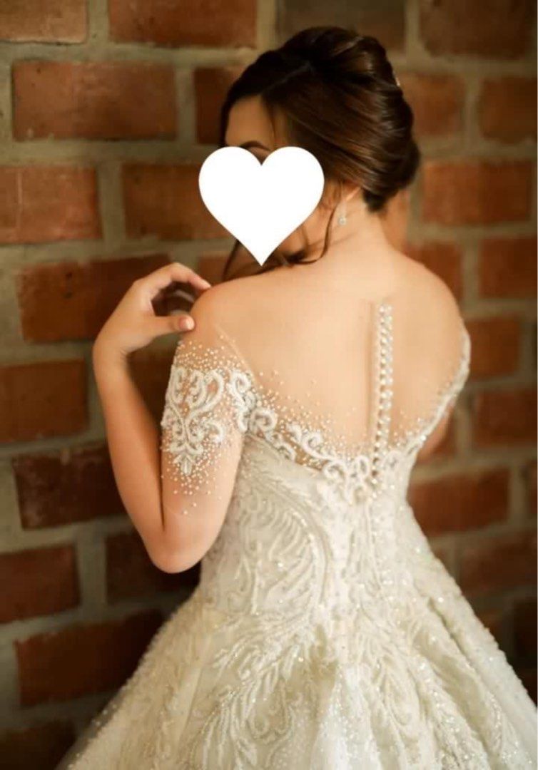 Preloved Wedding Gown by Mark’s Bride Manila (Category: Evening dresses & gowns) located in Quezon City. Submitted by gelleebeans (Listing ID 1370762894, Image 3). Description: ❤ high quality, fully beaded wedding gown with swarovski crystals made by Mark Brides Manila ❤ with long trail ❤ can fit medium body frame (33-28-34) ❤ inclusions: veil, 6 layer petticoat, cord, accesories ❗️gown is okay however beadwork has some yellowish discoloration wh