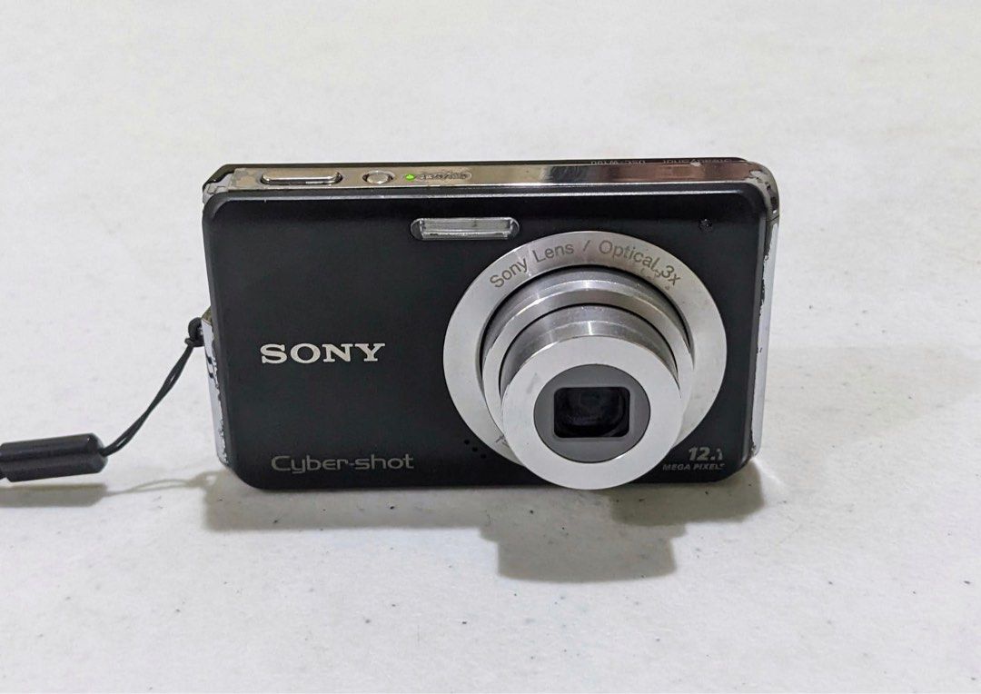 Sony Cybershot DSC W190 Digital Camera (Digicam) (Category: Cameras) located in Pasig City. Submitted by _mathilda (Listing ID 1370781043, Image 1). Description: 📸 Sony Cybershot DSC W190 — 12.1 Mega Pixels — 3x Optical Zoom — Image Stabilization — ISO: 100-3200 — Body Condition: 6/10 — LCD issue, signs of usage, and small spot on lens — Crisp photo quality — Fully functional (all buttons + flash working) — Shooting Modes: • Auto, Program, Scene