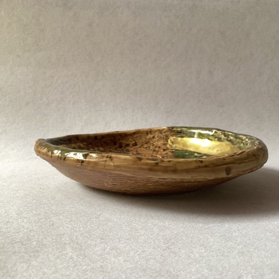 Stoneware Shallow Plate w/ Gold Brush Stroke Accent: signed (Category: Dinnerware & Cutlery) located in Davao. Submitted by eclectic1925 (Listing ID 1370778802, Image 2). Description: Php250 Stoneware Shallow Plate w/ Gold Brush Stroke Accent: signed H: 1.5 inches L: 6.2 inches *last price posted *please check photos before purchase First to pay .