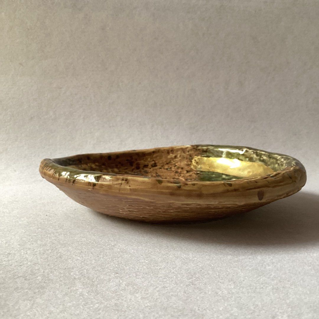 Stoneware Shallow Plate w/ Gold Brush Stroke Accent: signed (Category: Dinnerware & Cutlery) located in Davao. Submitted by atbpshop192593 (Listing ID 1370778948, Image 2). Description: Php250 Stoneware Shallow Plate w/ Gold Brush Stroke Accent: signed H: 1.5 inches L: 6.2 inches *last price posted *please check photos before purchase First to pay Free Shipping Nationwide on Orders of 3 Items or More.