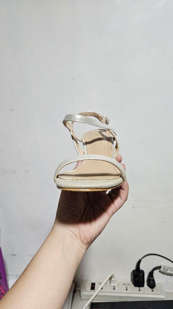 ULD silver sandals (Category: Heels) located in Valenzuela. Submitted by empot08 (Listing ID 1370767858, Image 2). Description: used twice only both on wedding occasion looks worn off but it is only because of storage size 35.