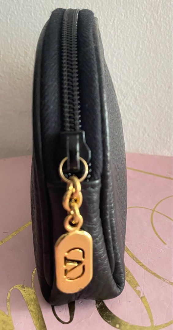 Valentino Garavani Mini Pouch (Category: Luxury Bags & Wallets) located in Pasig City. Submitted by lilhermes (Listing ID 1370692850, Image 2). Description: In very good condition, Height:5.5 inches Wide: 7.7 inches .